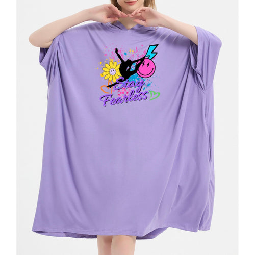 Oversized sleep tee in purple with a graphic design related to gymnastics on the front.
