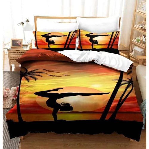 Bed covers featuring a gymnast and a sunrise or sunset on the beach.